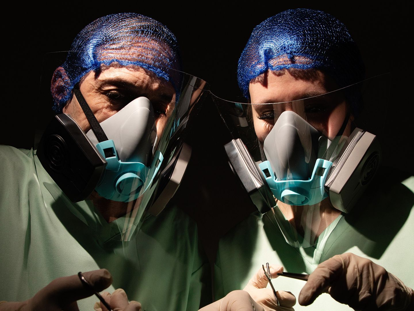 image: two workers with filtration masks