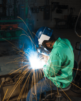 welder wearing industrial safety gear